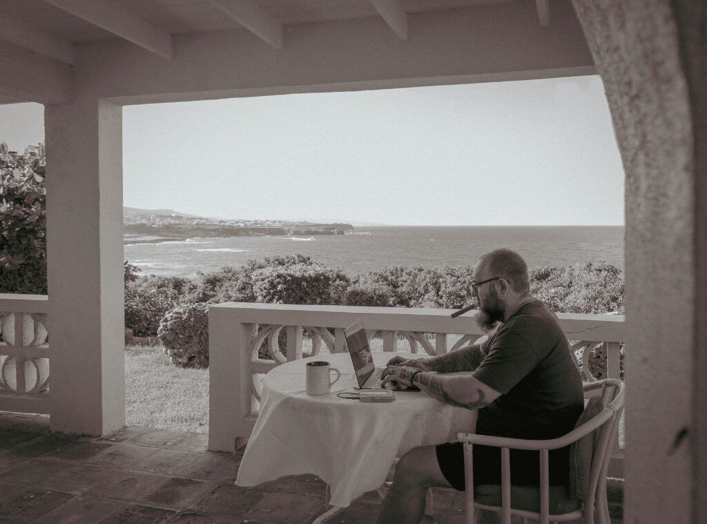 Author Jason Betzing Writing in Barbados